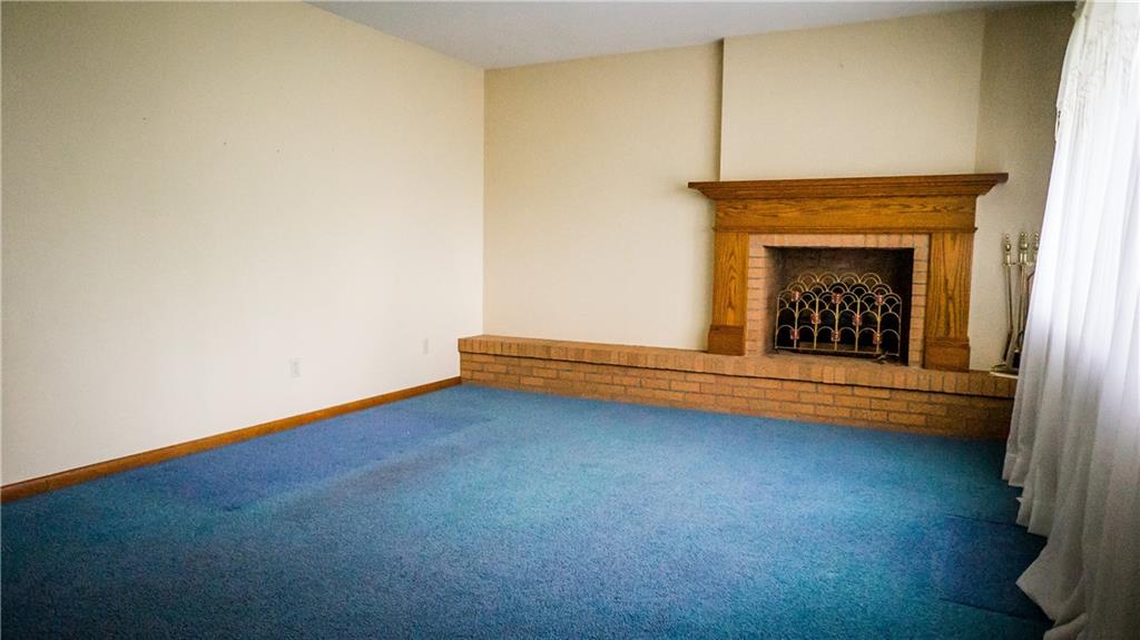 251 Welsh Road Valencia, PA 16059 - Photo 6 of 25 Brick and Wooden Accents Compliment this Spacious 13x11 Living Room