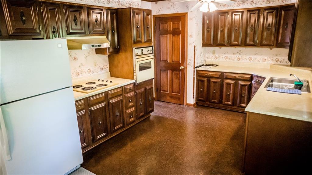 251 Welsh Road Valencia, PA 16059 - Photo 7 of 25 Rustic Wooden Cabinets Compliment this Vintage 13x11 Kitchen