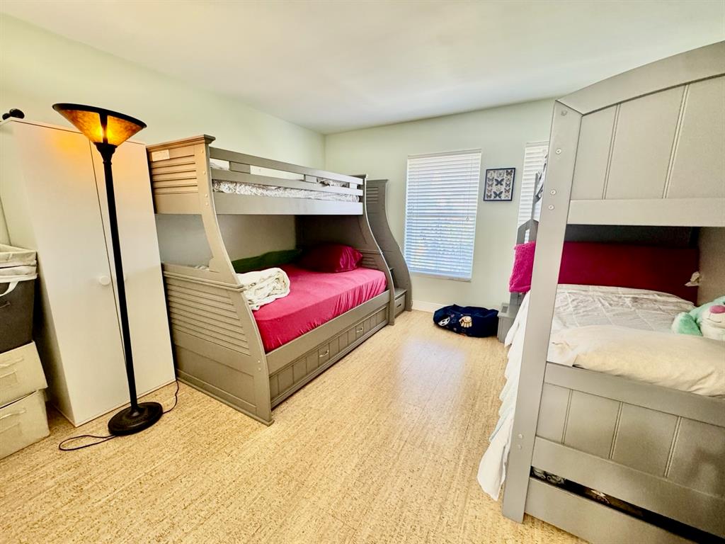 800 East Camino Real, Unit PH4160 Boca Raton, FL 33432 - Photo 21 of 22 a bedroom with a bed and a window