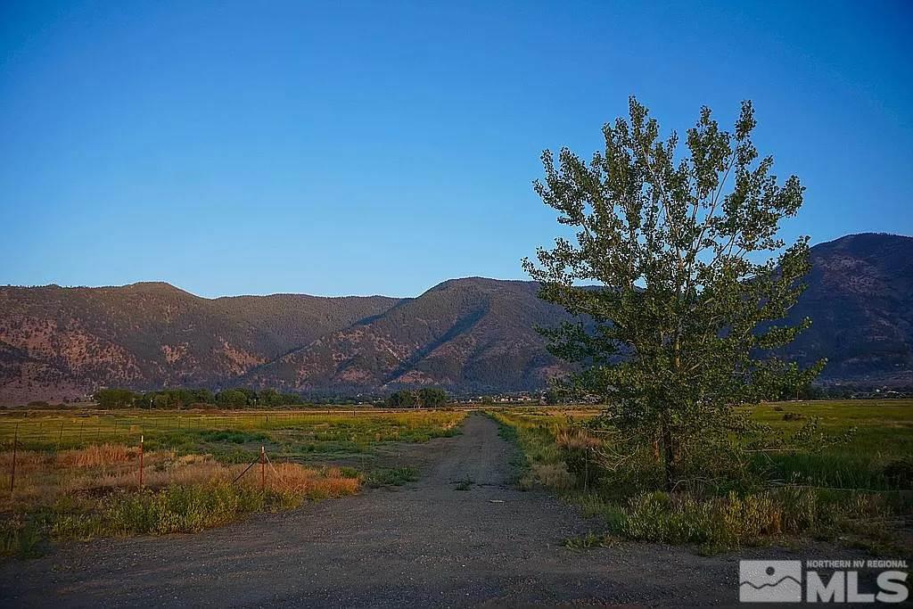 500 Two Ranch Road Genoa, NV 89411 - Photo 4 of 9 a view of a lake with mountains in the background