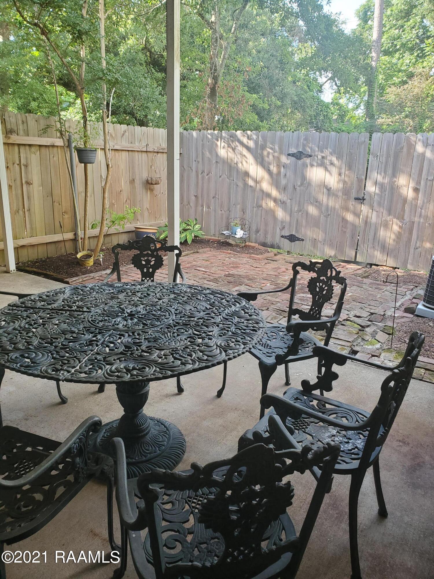465 Rena Drive, Unit 465 Lafayette, LA 70503 - Photo 13 of 15 Covered, enclosed patio