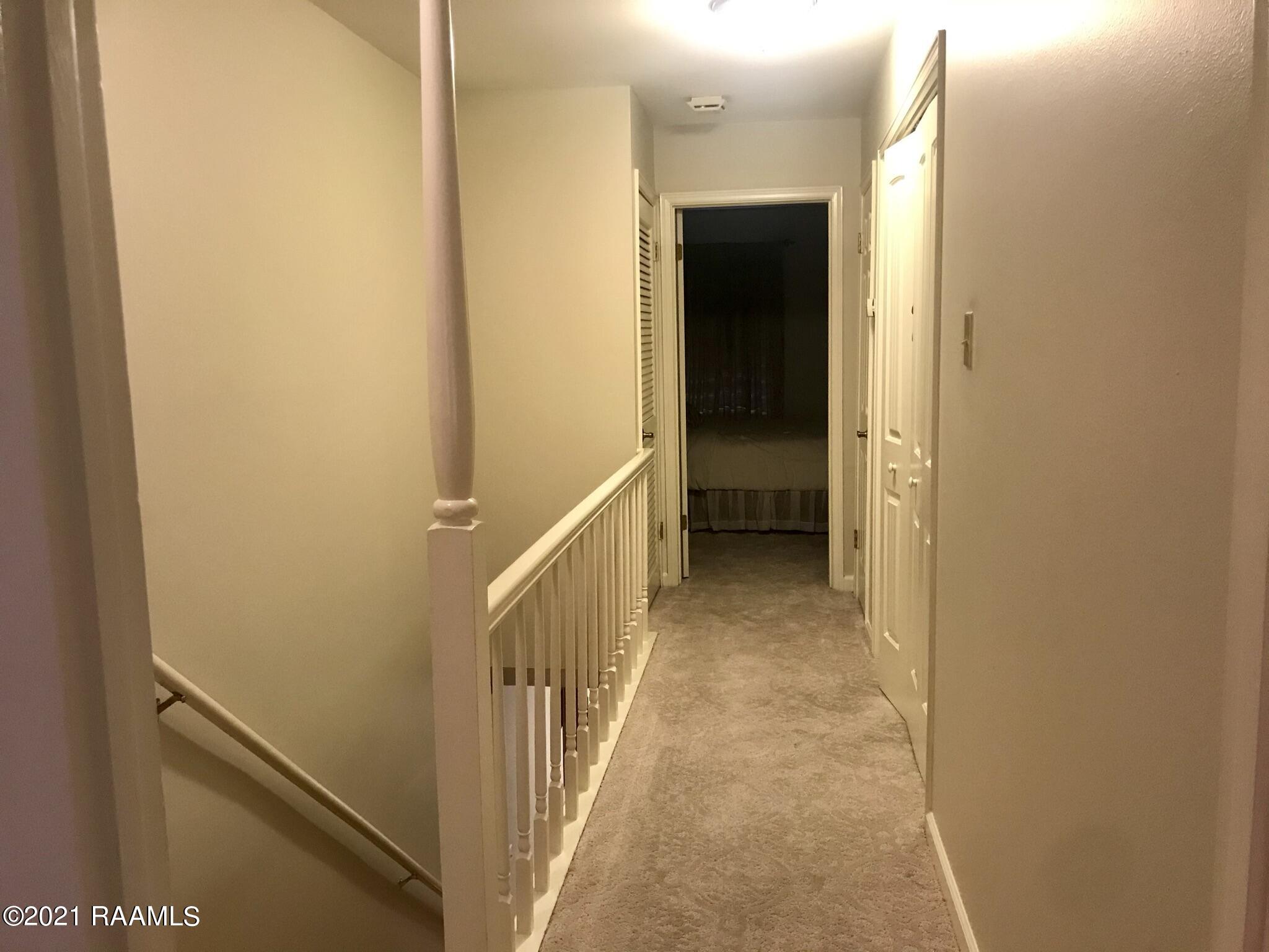 465 Rena Drive, Unit 465 Lafayette, LA 70503 - Photo 8 of 15 Upstairs hallway