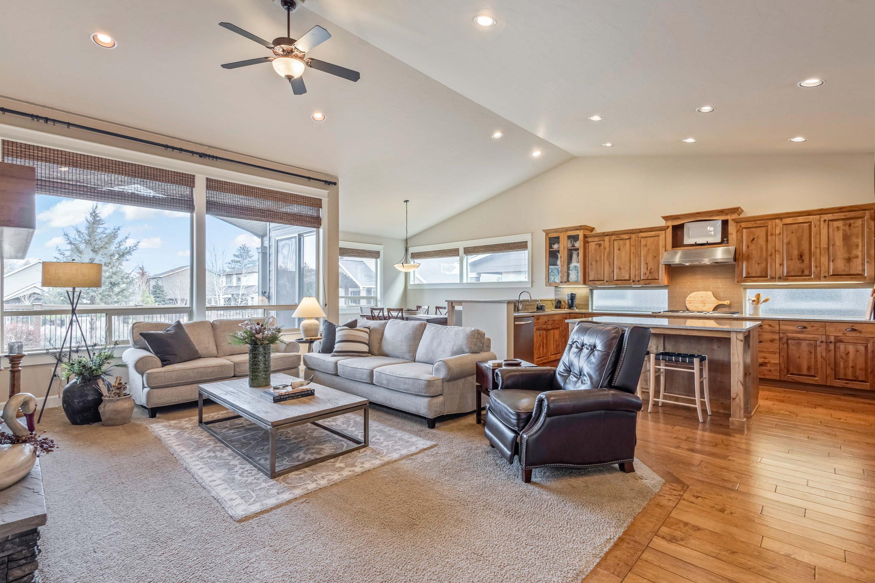 Vaulted great room & kitchen with incredible natural light.