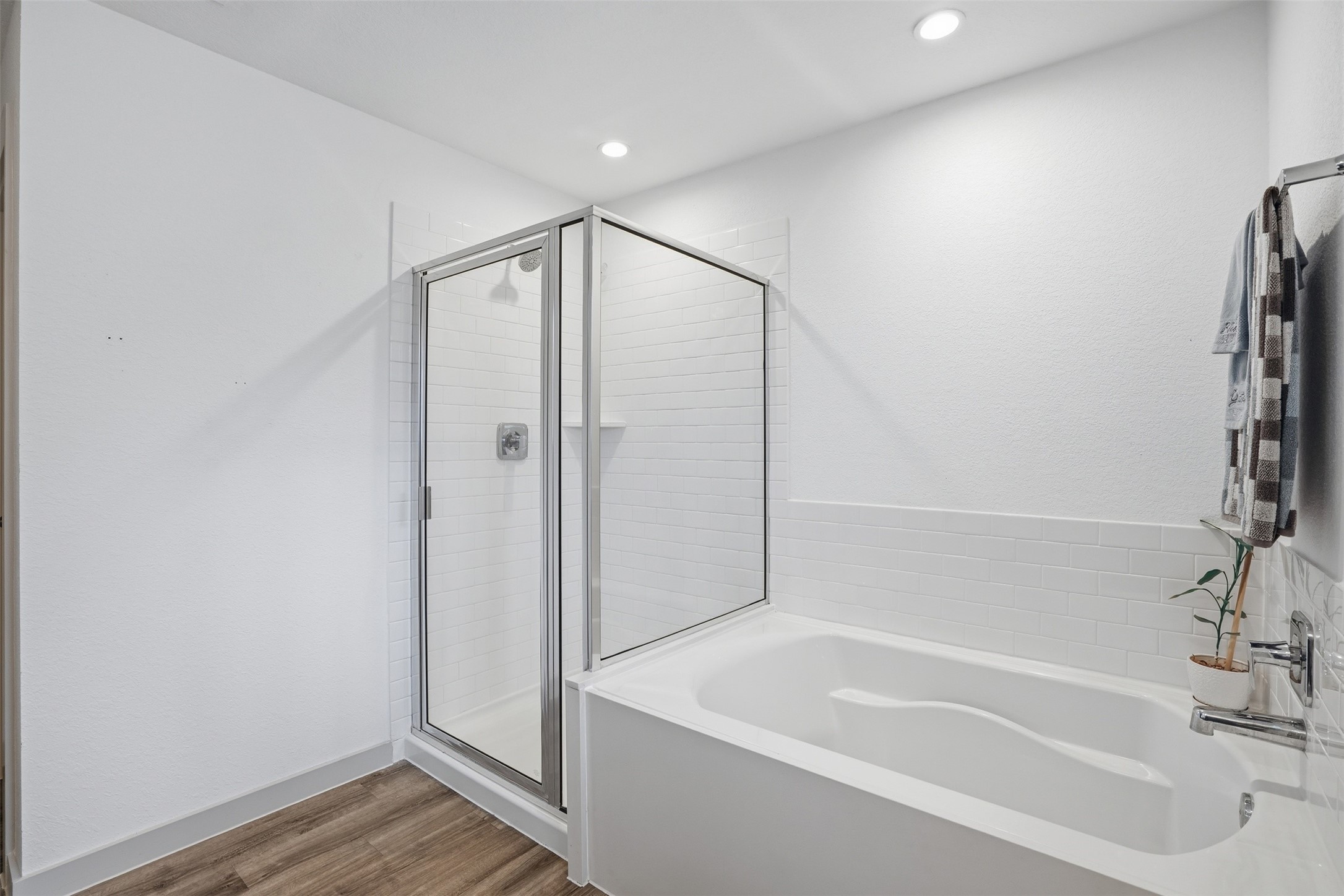 1022 Curly Angora Court Rosharon, TX 77583 - Photo 15 of 17 a bathroom with a bathtub and a shower