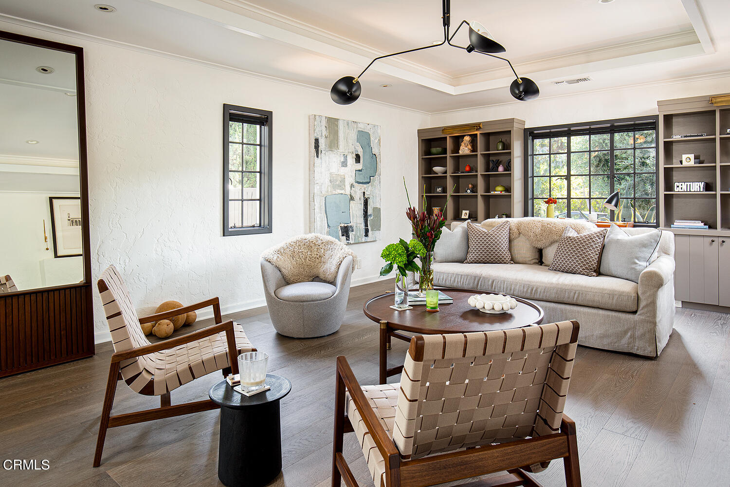 1146 Wotkyns Drive Pasadena, CA 91103 - Photo 13 of 63 a living room with furniture a chandelier and a dining table