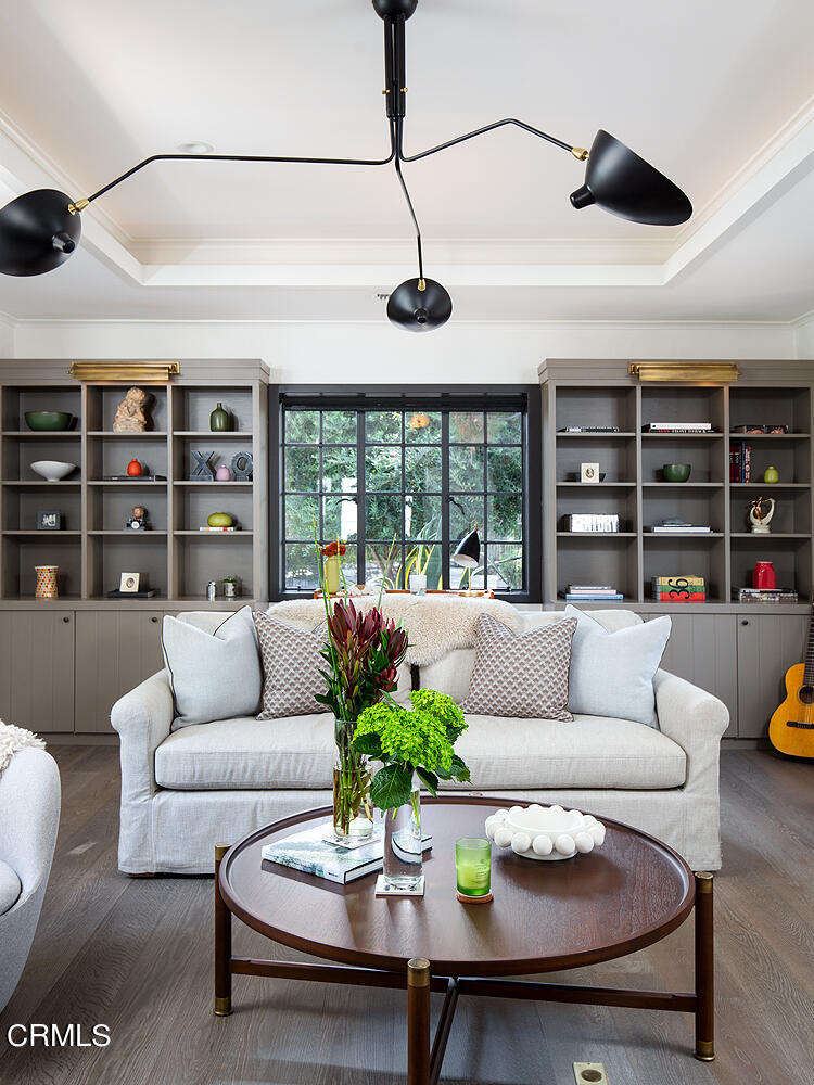 1146 Wotkyns Drive Pasadena, CA 91103 - Photo 15 of 63 a living room with furniture and a floor to ceiling window