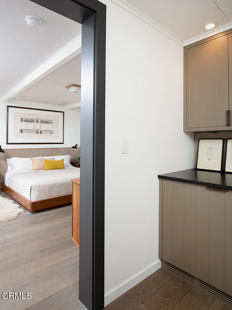 1146 Wotkyns Drive Pasadena, CA 91103 - Photo 31 of 63 a bedroom with a bed and a television