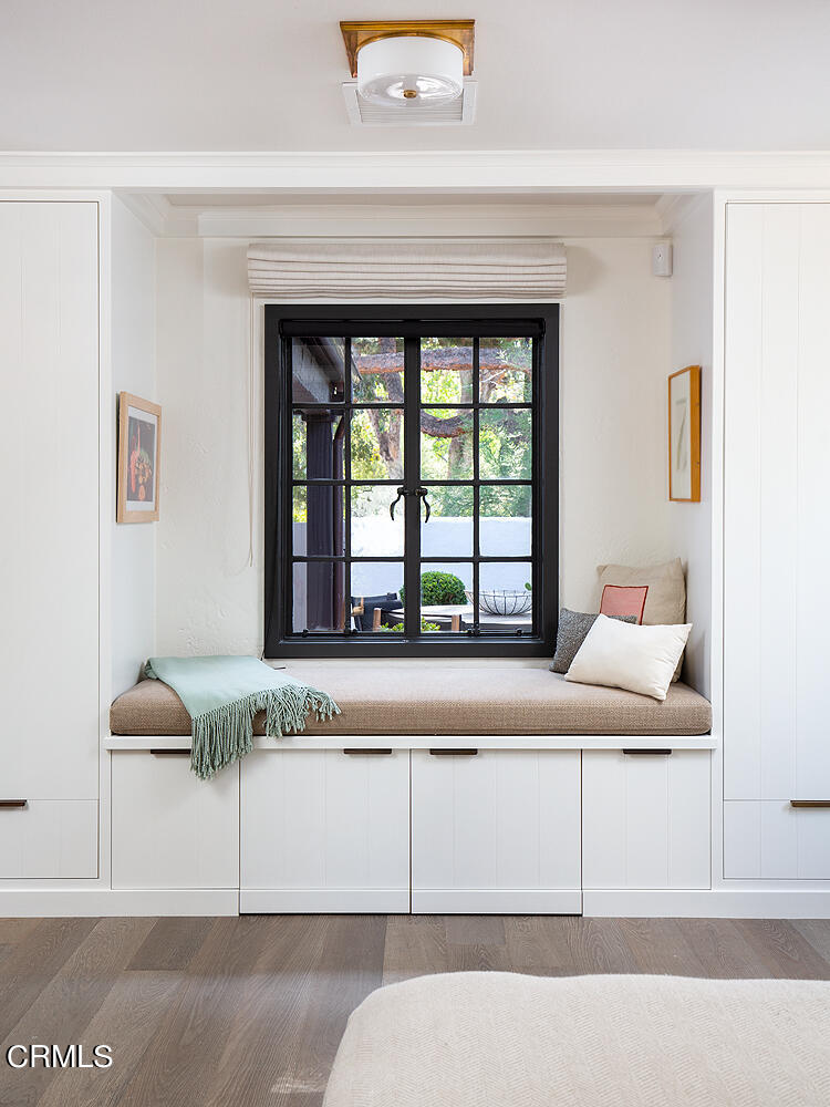 1146 Wotkyns Drive Pasadena, CA 91103 - Photo 34 of 63 a living room with a bed and a large window