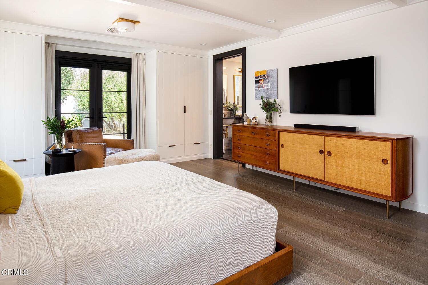 1146 Wotkyns Drive Pasadena, CA 91103 - Photo 35 of 63 a bedroom with a flat screen tv and a bed