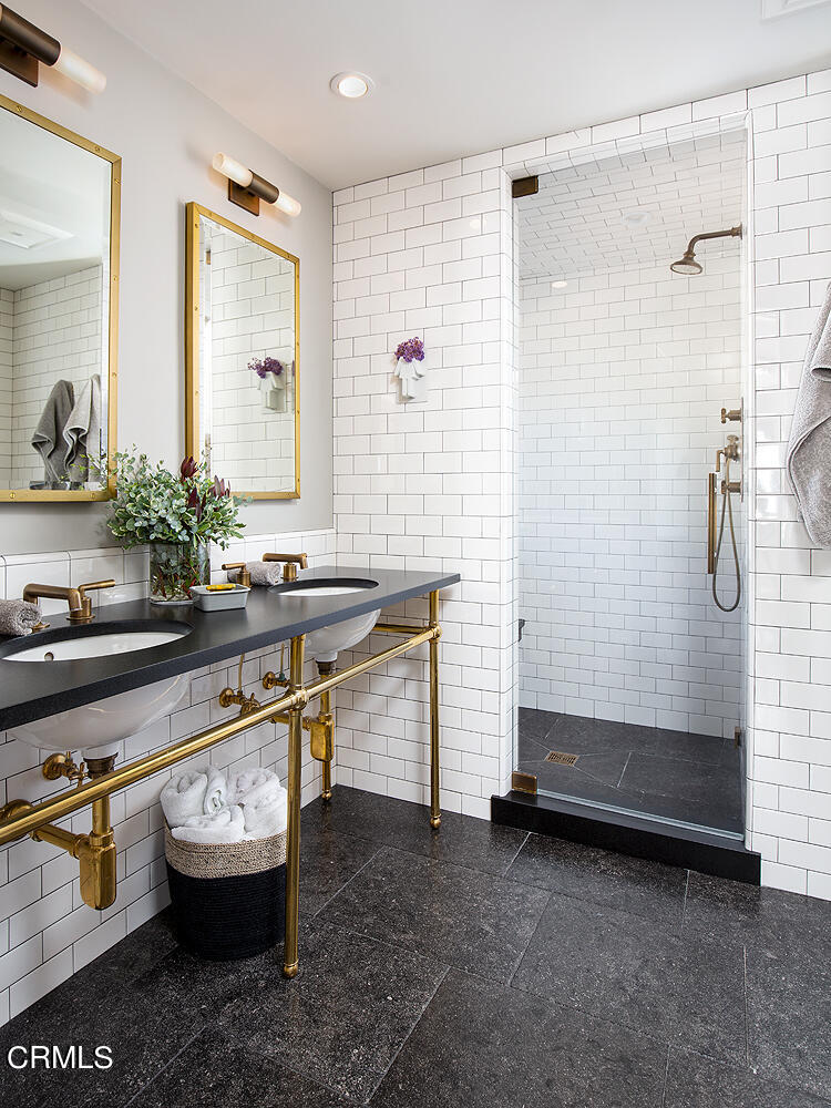 1146 Wotkyns Drive Pasadena, CA 91103 - Photo 36 of 63 a bathroom with a sink a toilet and shower