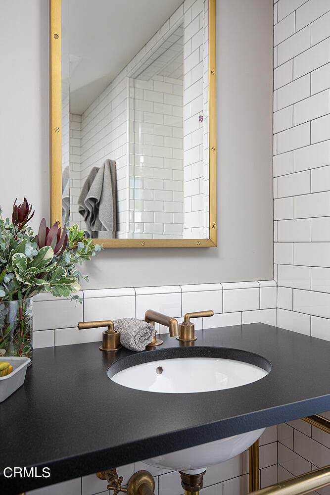 1146 Wotkyns Drive Pasadena, CA 91103 - Photo 37 of 63 a close view of sink and mirror