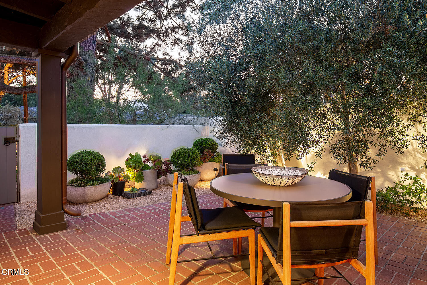 1146 Wotkyns Drive Pasadena, CA 91103 - Photo 53 of 63 a view of a dining table and chairs in a patio