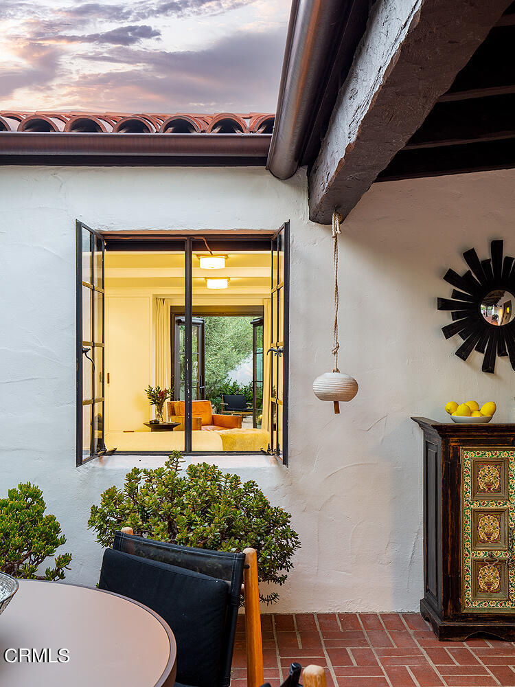 1146 Wotkyns Drive Pasadena, CA 91103 - Photo 54 of 63 a view of a porch with chairs and potted plants