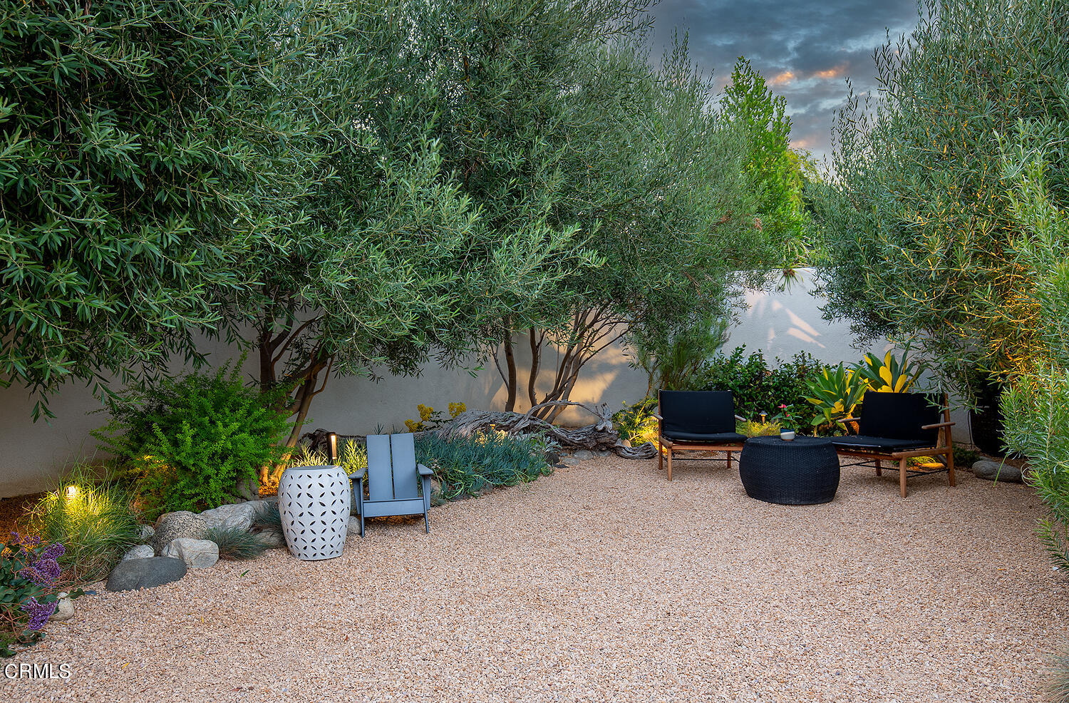1146 Wotkyns Drive Pasadena, CA 91103 - Photo 56 of 63 a view of a couch with potted plants and large trees