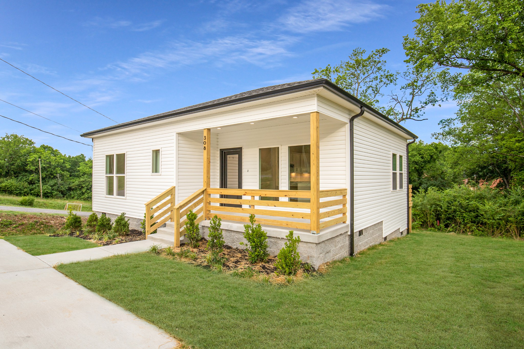 308 Larkin Springs Road Madison, TN 37115 - Photo 24 of 25 a view of a house with a yard