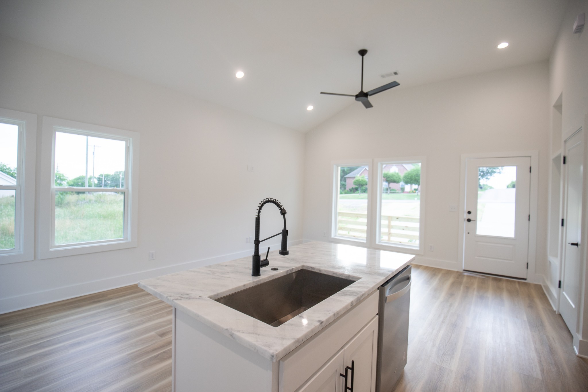 308 Larkin Springs Road Madison, TN 37115 - Photo 5 of 25 a kitchen with a stove a sink and a window