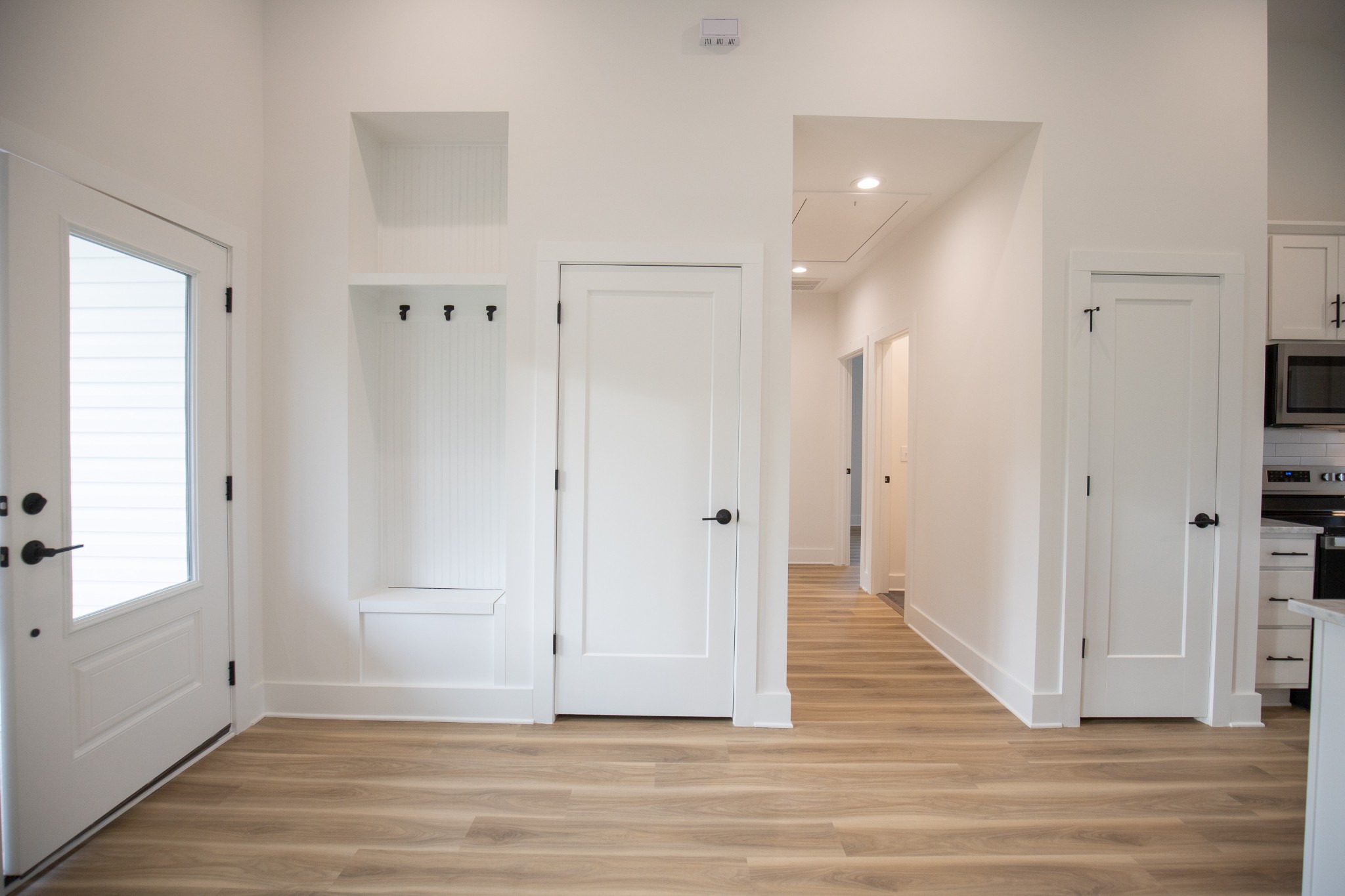 308 Larkin Springs Road Madison, TN 37115 - Photo 10 of 25 a view of a hallway with wooden floor