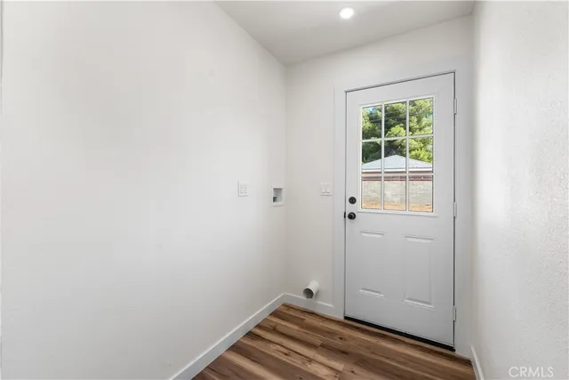 a view of small space with wooden floor