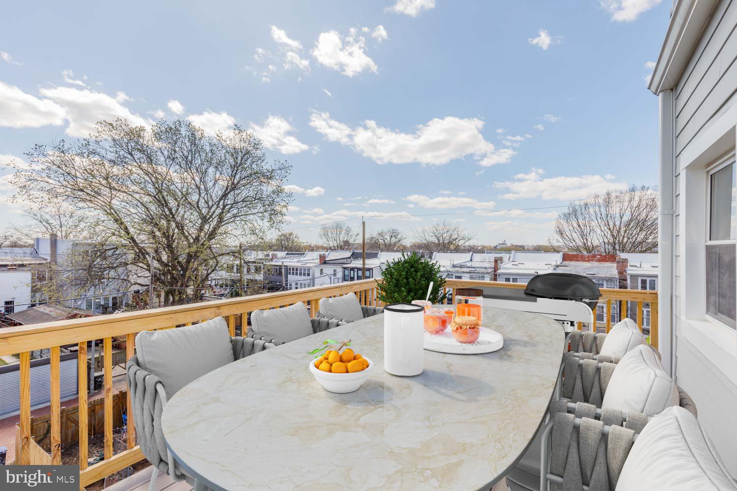 424 Taylor Street Northwest, Unit 2 Washington, DC 20011 - Photo 11 of 49 a outdoor dining space with furniture and city view