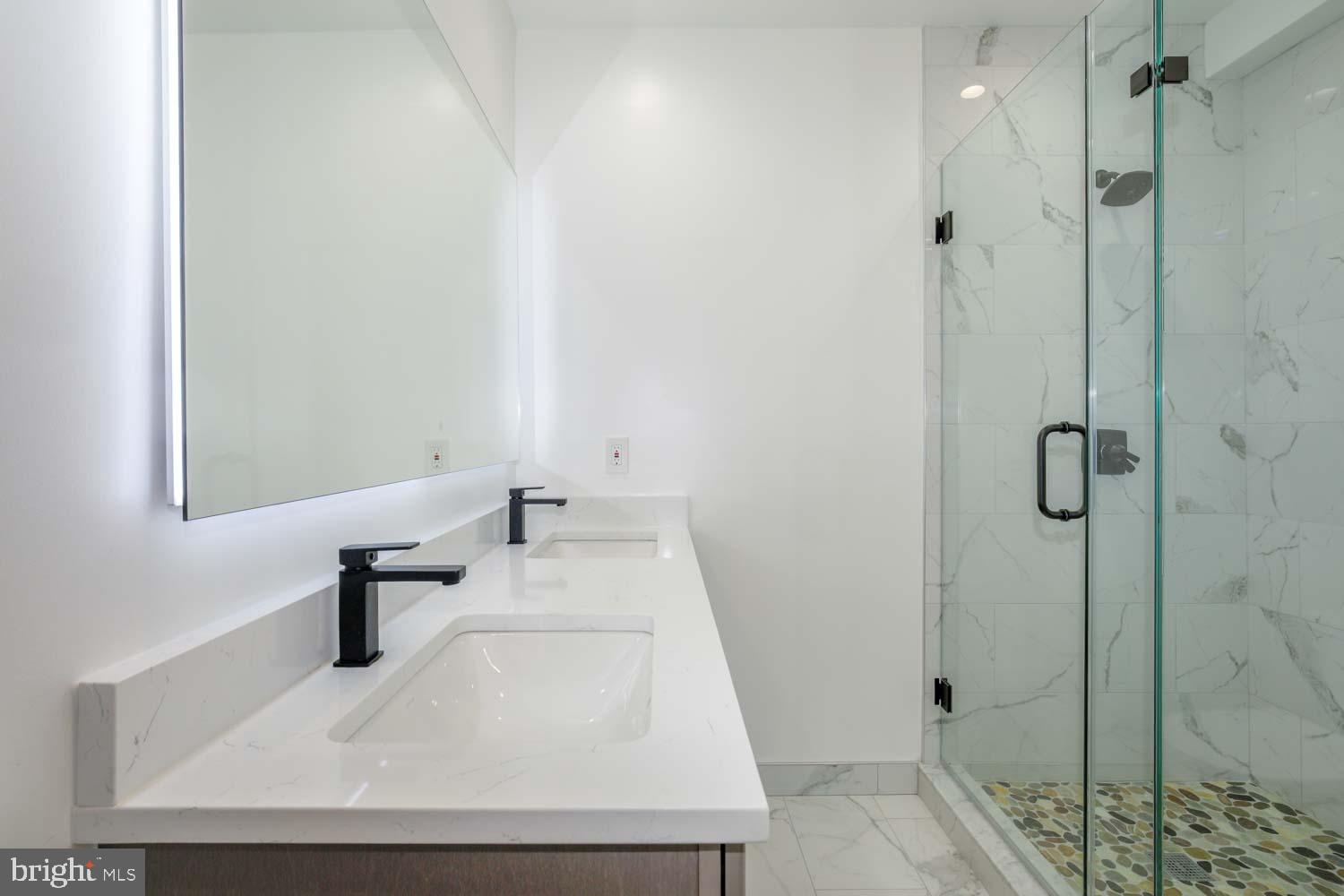 424 Taylor Street Northwest, Unit 2 Washington, DC 20011 - Photo 29 of 49 a bathroom with a sink