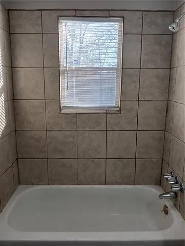 a bathroom with a bathtub