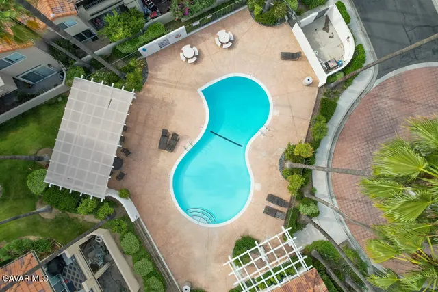 an aerial view of a swimming pool