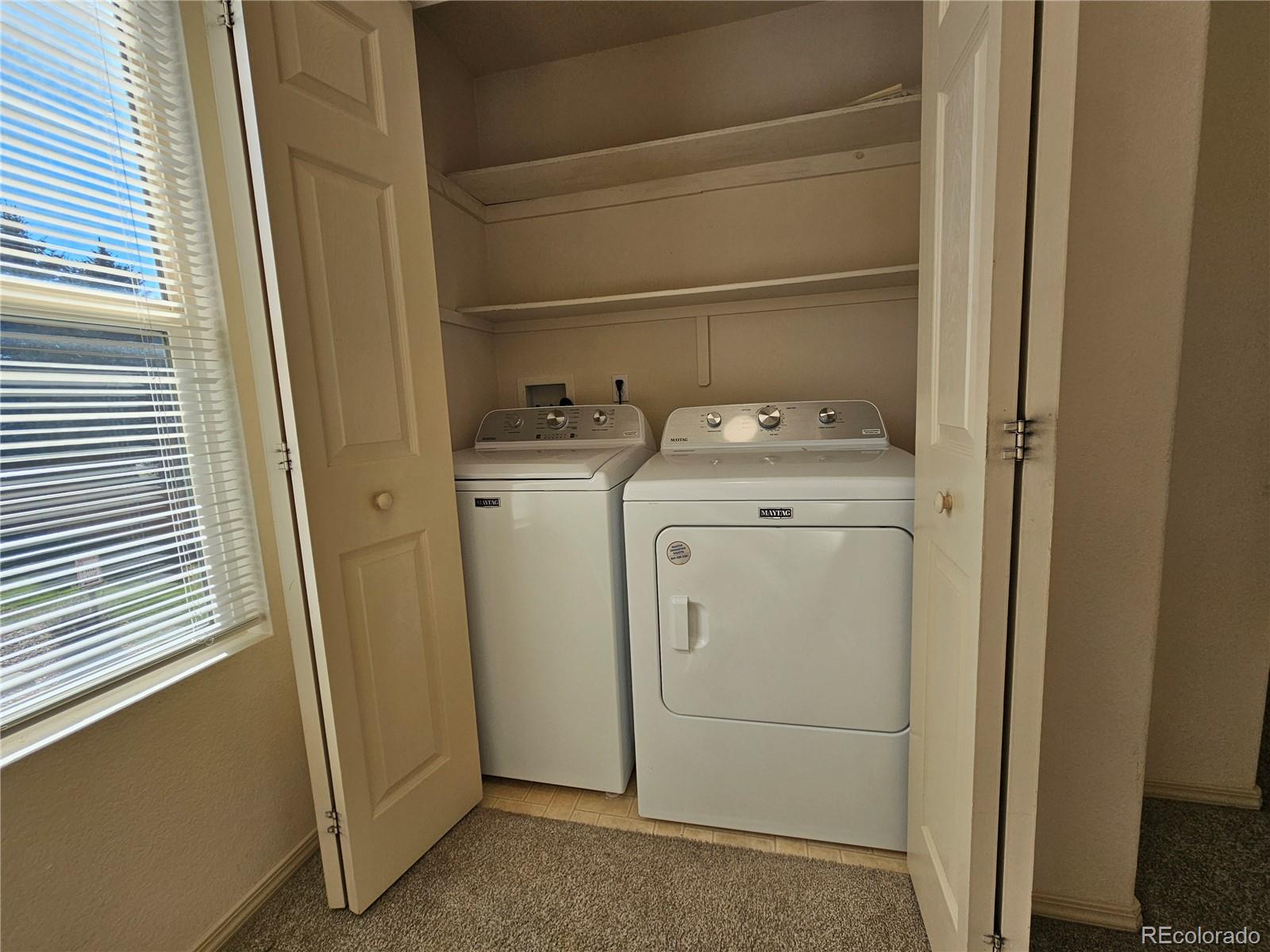 5638 Appalachian View Colorado Springs, CO 80918 - Photo 9 of 21 a utility room with dryer and washer