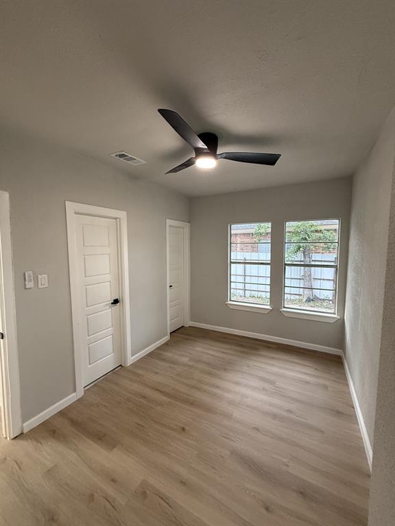 758 Bethpage Avenue Dallas, TX 75217 - Photo 12 of 20 a view of an empty room with a window