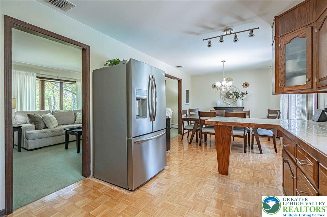 3857 Friedens Road Slatington, PA 18080 - Photo 29 of 75 This inviting space offers a seamless transition between the dining area and a comfortable living room.