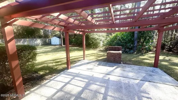 a view of swimming pool with a patio