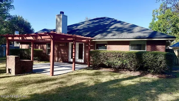 a house view with a garden space