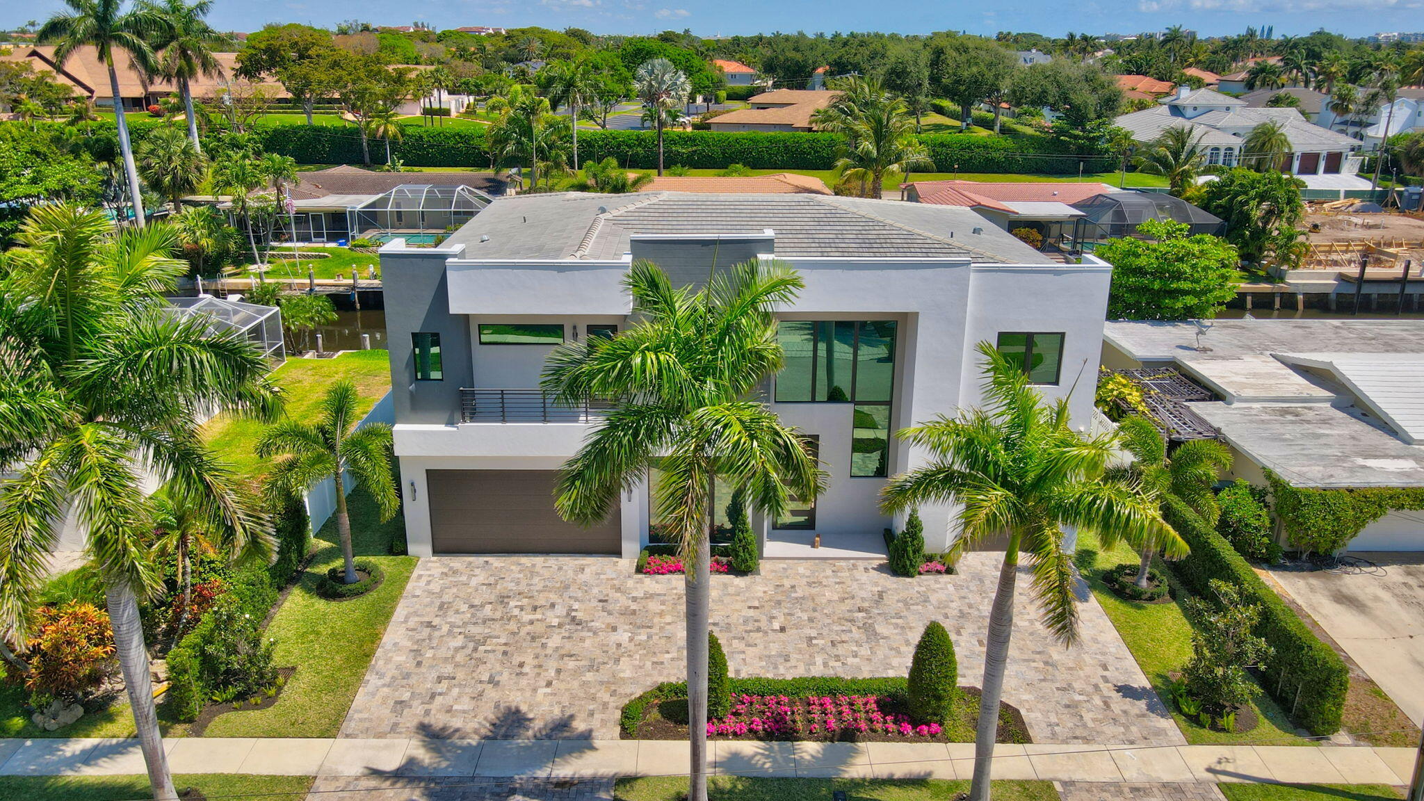 725 Northeast 71st Street Boca Raton, FL 33487 - Photo 59 of 66 an aerial view of a house with yard