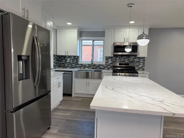 $1,079,000 | 130-16 233rd Street | Laurelton