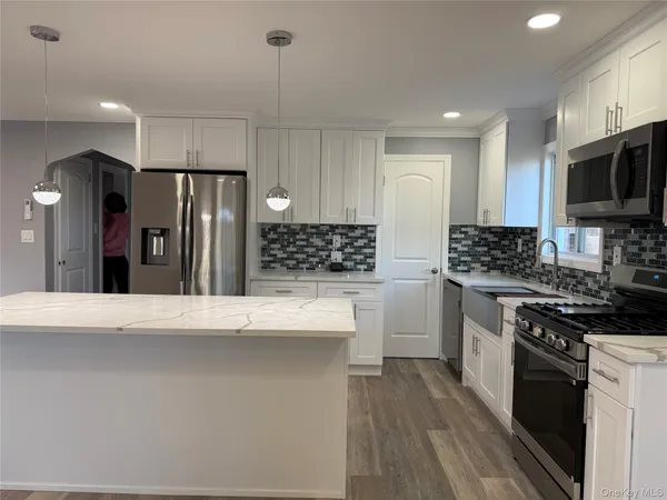 $1,079,000 | 130-16 233rd Street | Laurelton