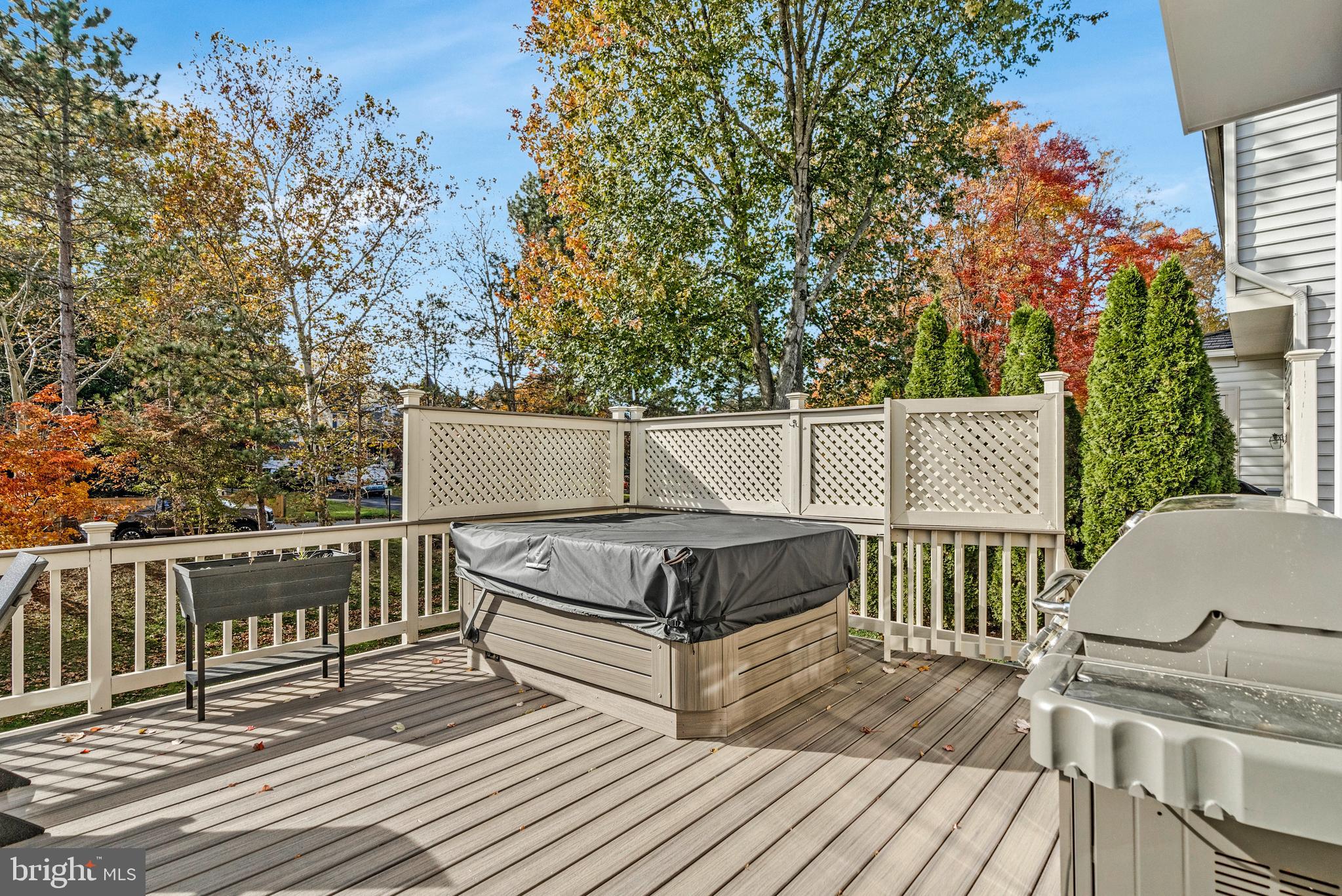 9733 Hidden Valley Road Vienna, VA 22181 - Photo 6 of 11 a view of balcony with wooden floor and fence