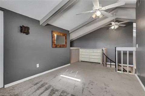 a view of a livingroom with a staircase