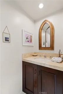 a bedroom with a large bed and a large window