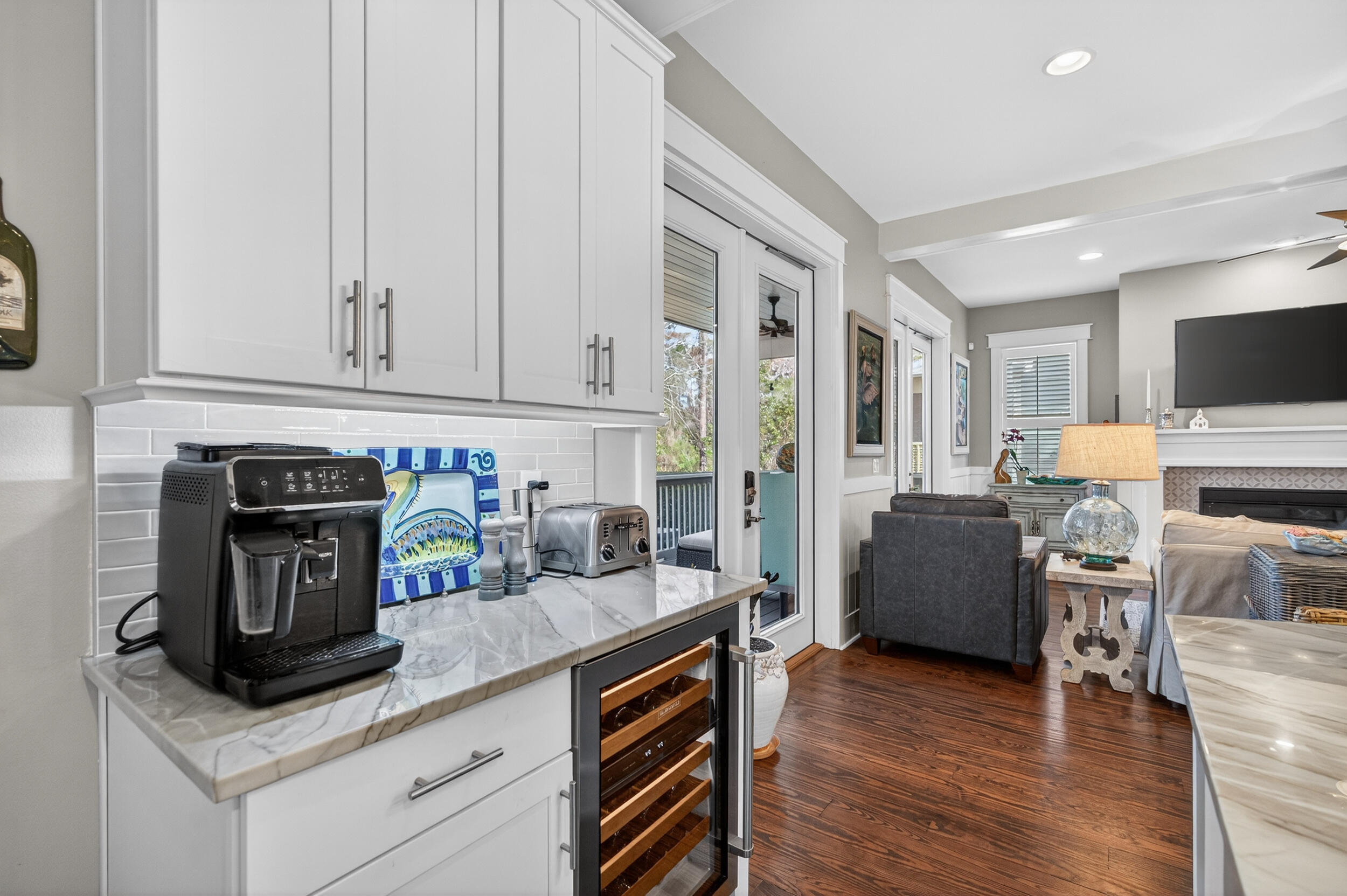 563 Sandgrass Boulevard Santa Rosa Beach, FL 32459 - Photo 16 of 73 a kitchen with stainless steel appliances granite countertop a stove and a white cabinets