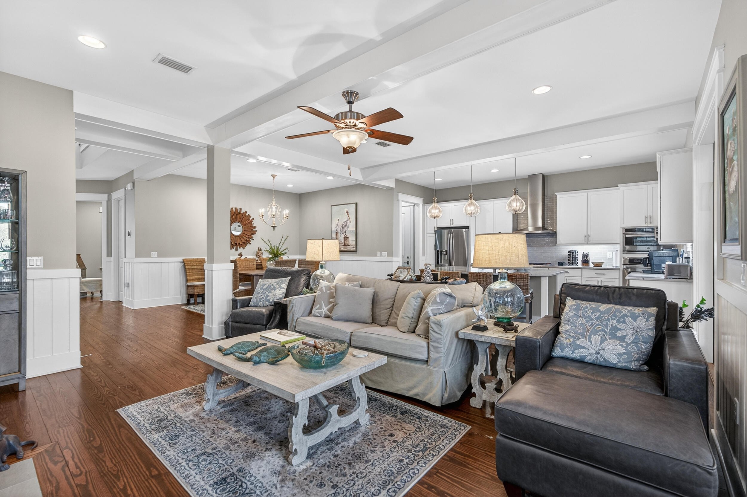 563 Sandgrass Boulevard Santa Rosa Beach, FL 32459 - Photo 22 of 73 a living room with furniture and a wooden floor