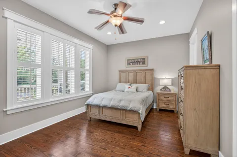 a white bath tub sitting next to a window