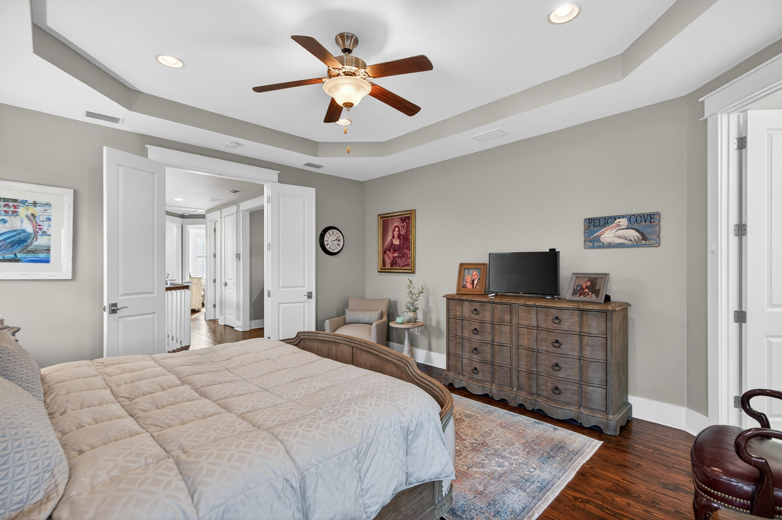 563 Sandgrass Boulevard Santa Rosa Beach, FL 32459 - Photo 34 of 73 a bedroom with a bed and a chandelier