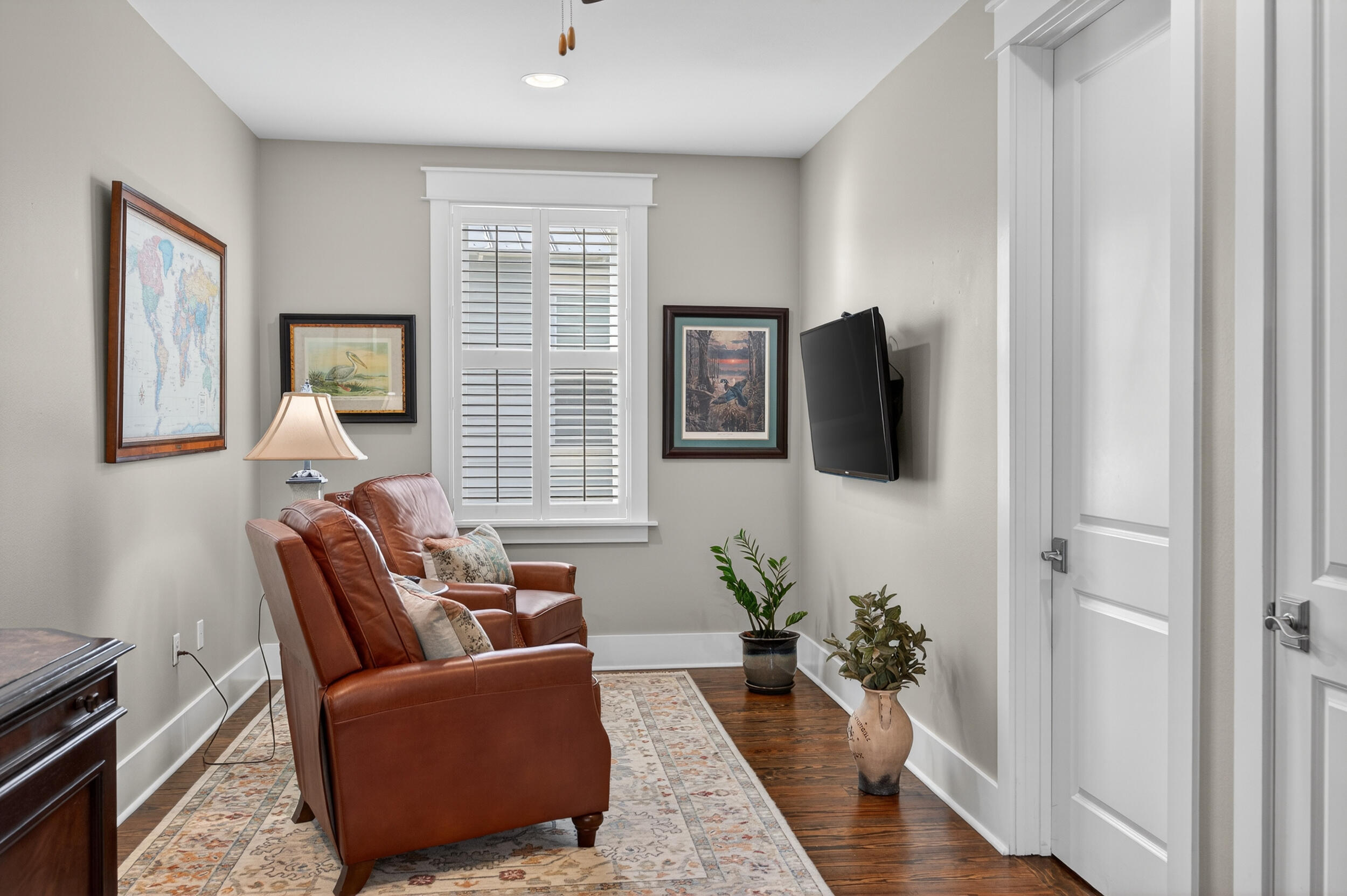 563 Sandgrass Boulevard Santa Rosa Beach, FL 32459 - Photo 39 of 73 a living room with furniture and wooden floor