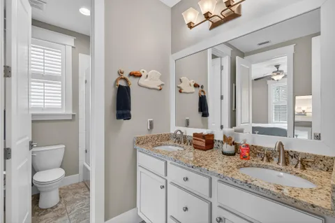 a view of a swimming pool with outdoor seating