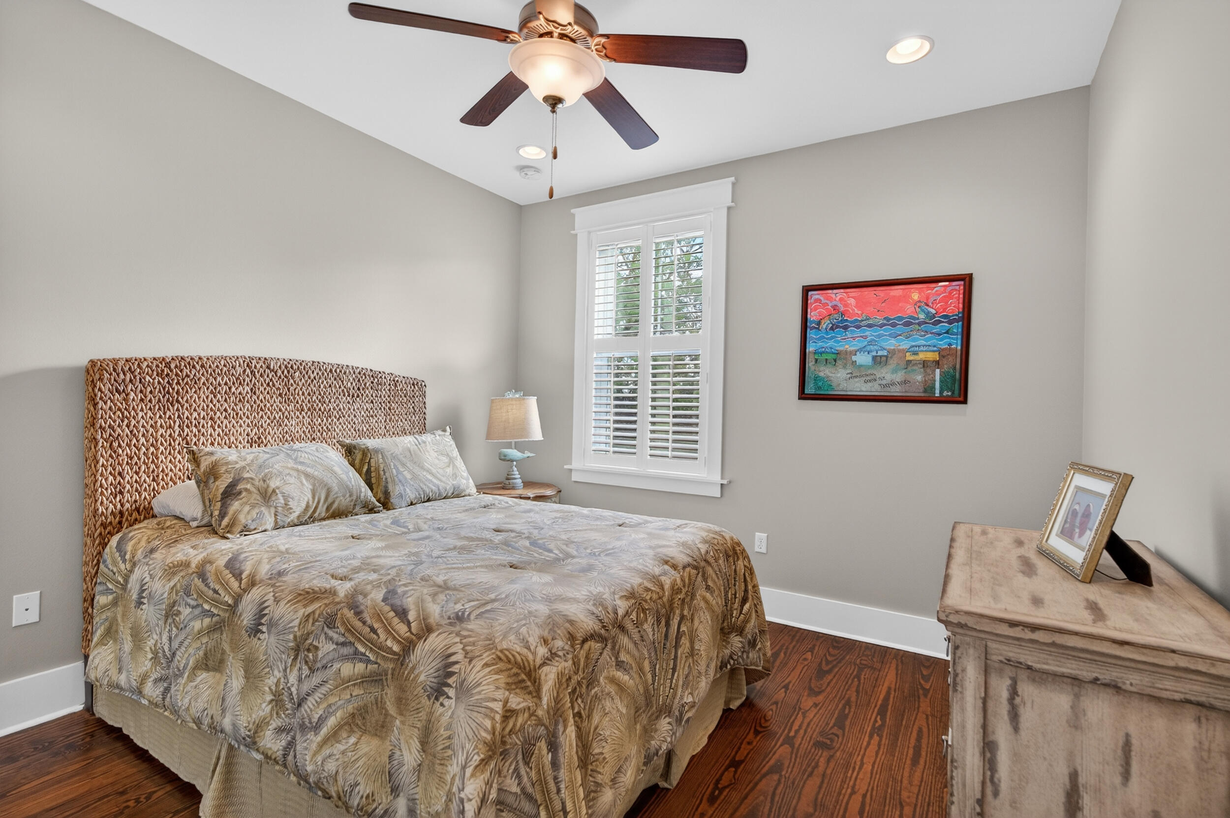 563 Sandgrass Boulevard Santa Rosa Beach, FL 32459 - Photo 47 of 73 a bedroom with a large bed and a chandelier