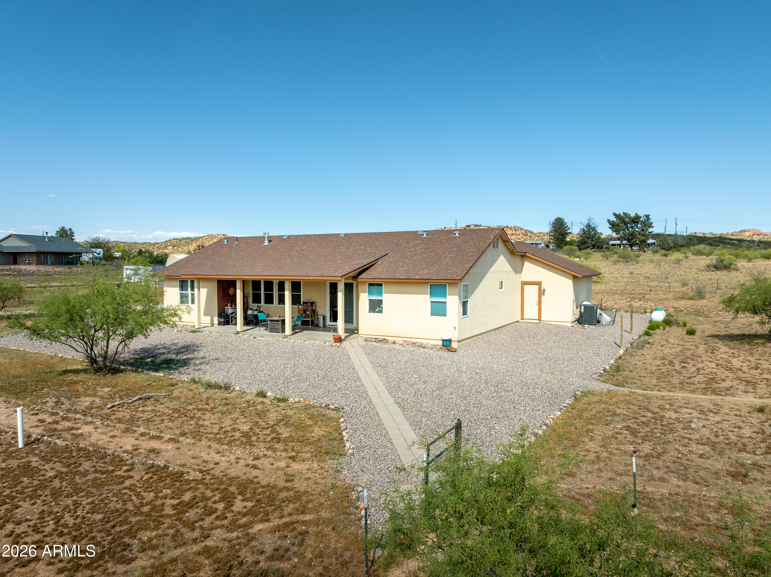 2771 South Country Hill Road Cornville, AZ 86325 - Photo 12 of 48 a view of a house with a yard and lake view