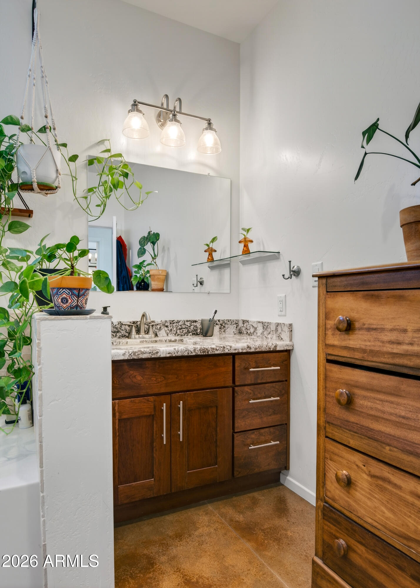 2771 South Country Hill Road Cornville, AZ 86325 - Photo 41 of 48 a bathroom with a granite countertop sink and a mirror