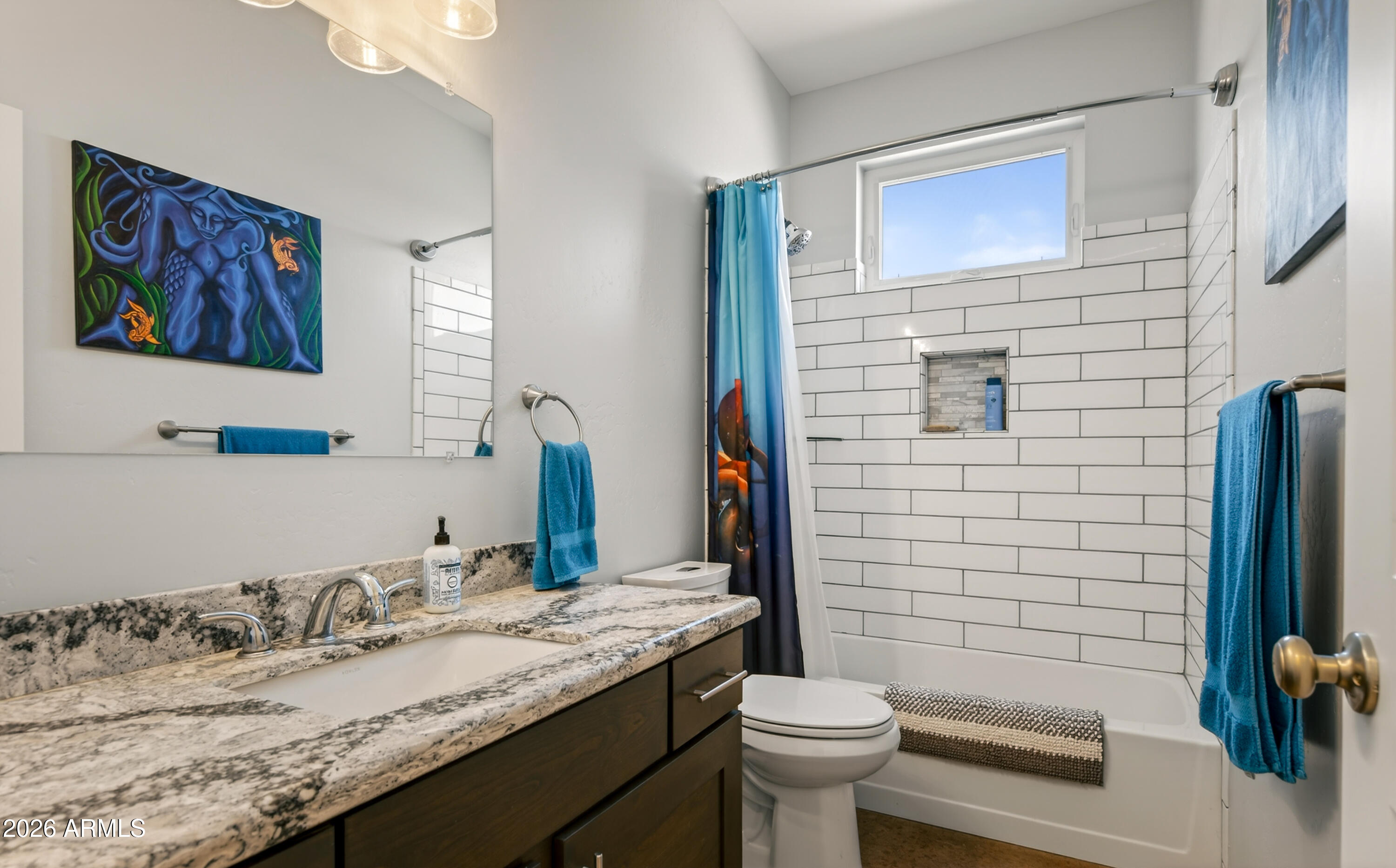 2771 South Country Hill Road Cornville, AZ 86325 - Photo 46 of 48 a bathroom with a granite countertop toilet sink and mirror