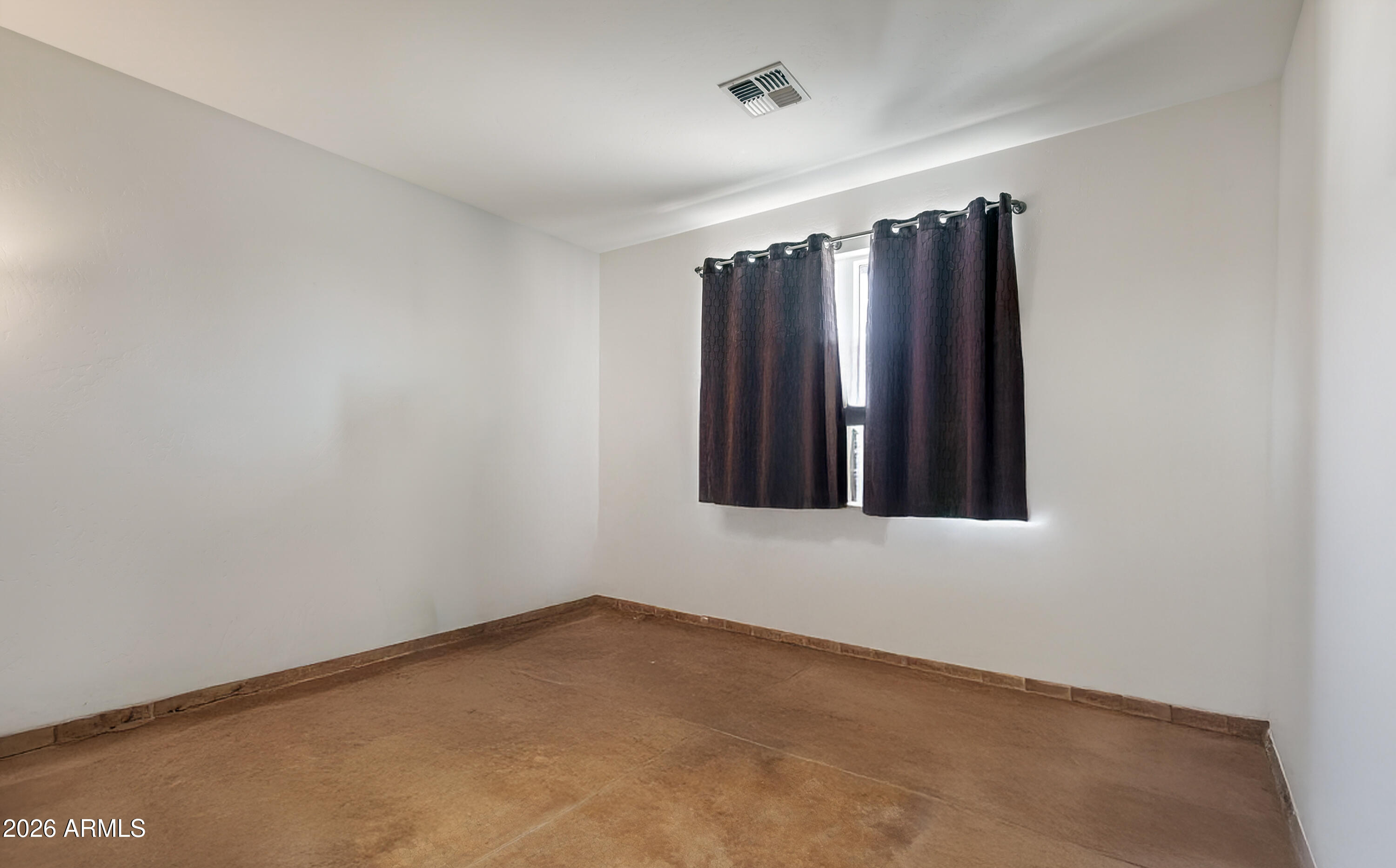 2771 South Country Hill Road Cornville, AZ 86325 - Photo 47 of 48 an empty room with windows