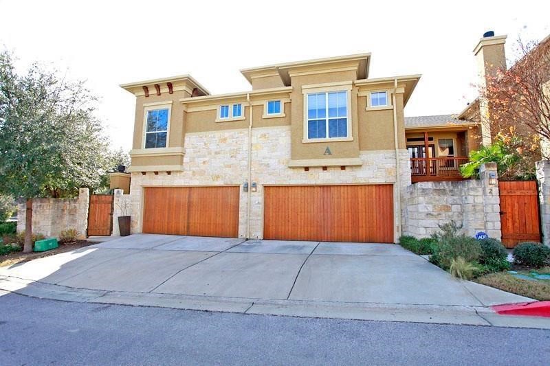 3406 Menchaca Road, Unit 2 Austin, TX 78704 - Photo 1 of 1 a front view of a house with a yard