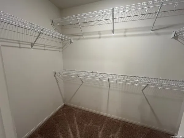 a view of a room with racks on the wall